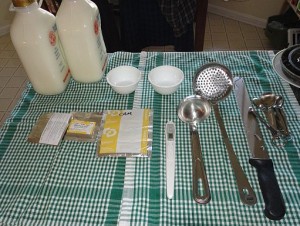 Milk and equipment - thermometer, ladles, etc. all sterilized 