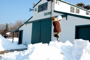 Piled high snow invites a classic snowball fight